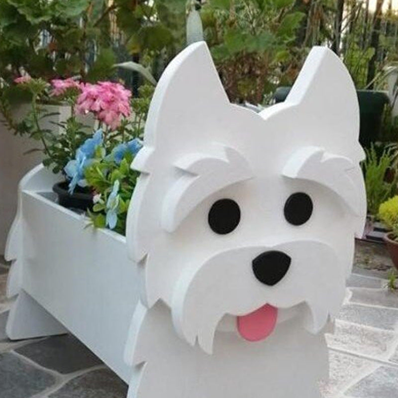 White dog-shaped planter with black eyes and a pink tongue in a garden setting