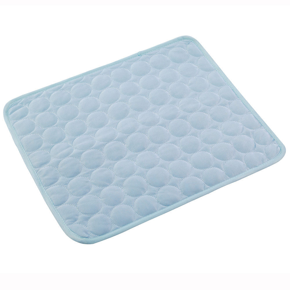 Light blue quilted self-cooling pet mat on a white background