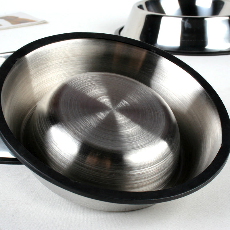 Metallic bowls on a white surface