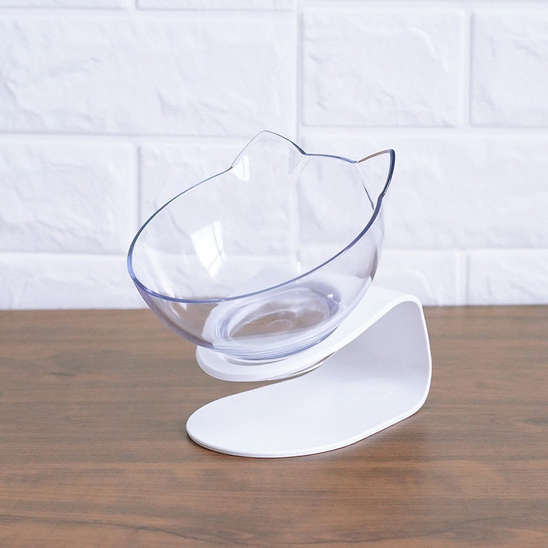 Clear cat shaped bowl with white base on a wooden surface