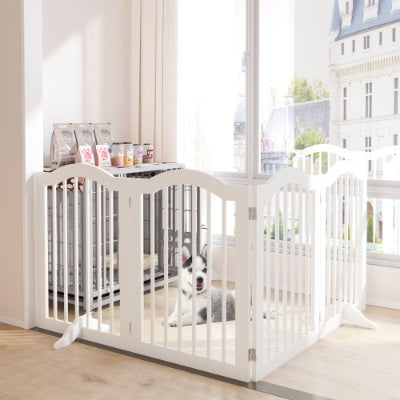 White pet gate in a room with a dog inside