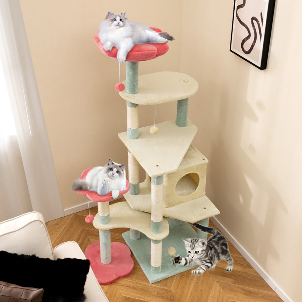 Cat tree with multiple levels and platforms in a room setting.
