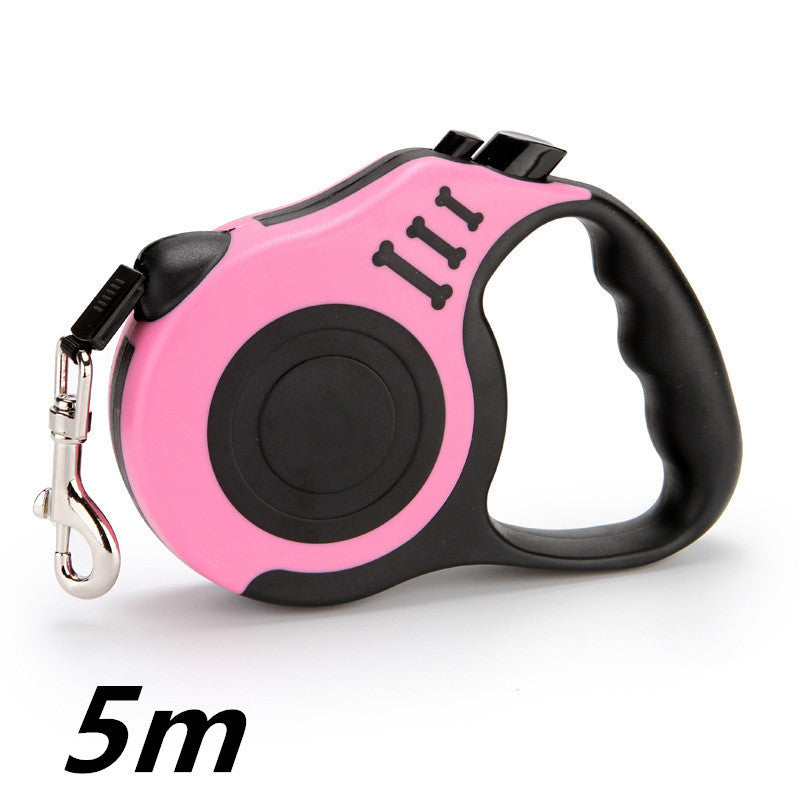 Pink and black retractable dog leash on a white background