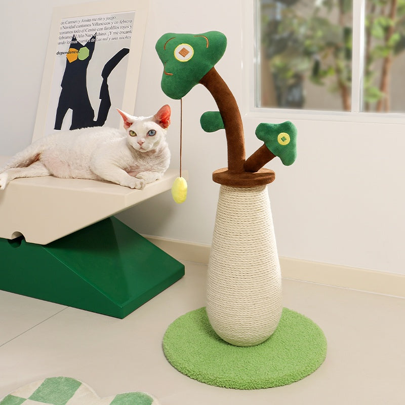 Cat playing with a green and brown cat tree in a room with a window.