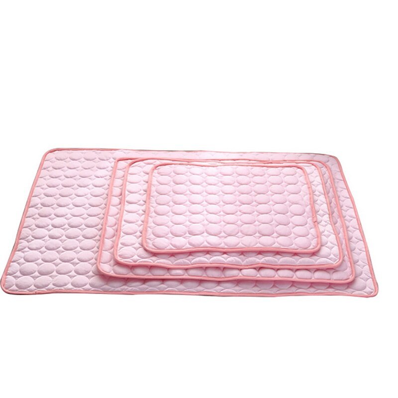 Set of three pink self-cooling pet pad with textured pattern on a white background