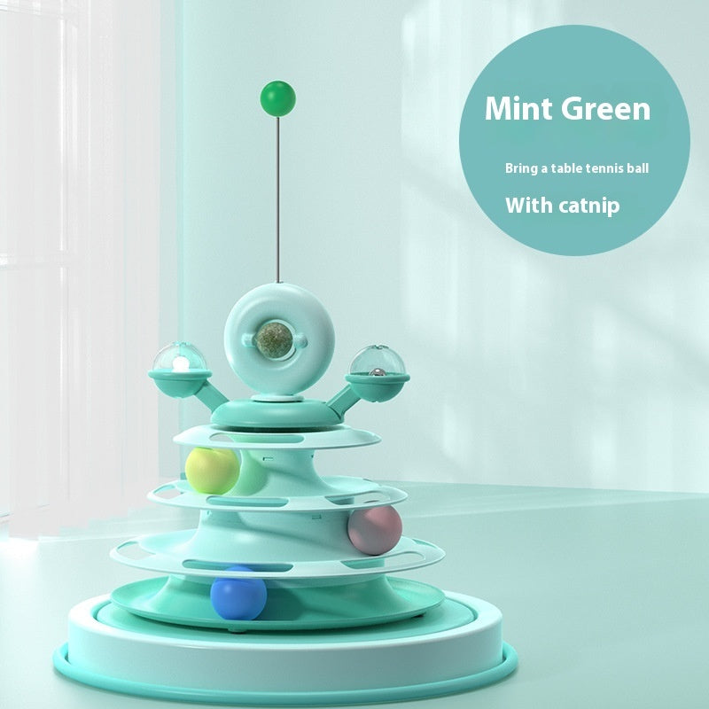 Mint green cat toy with colorful balls on a light background