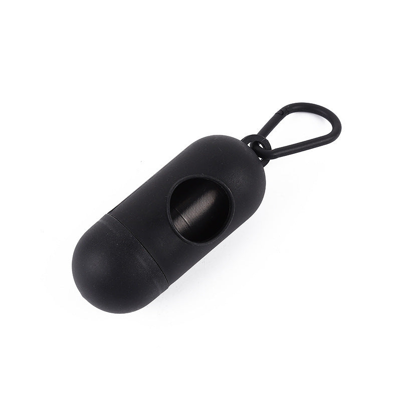 Black poop bags with a clip on a white background