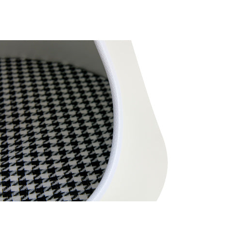 Close-up of a black and white checkered pattern on a white background