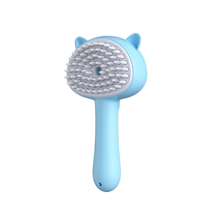 Blue pet grooming brush with a white bristle head on a white background