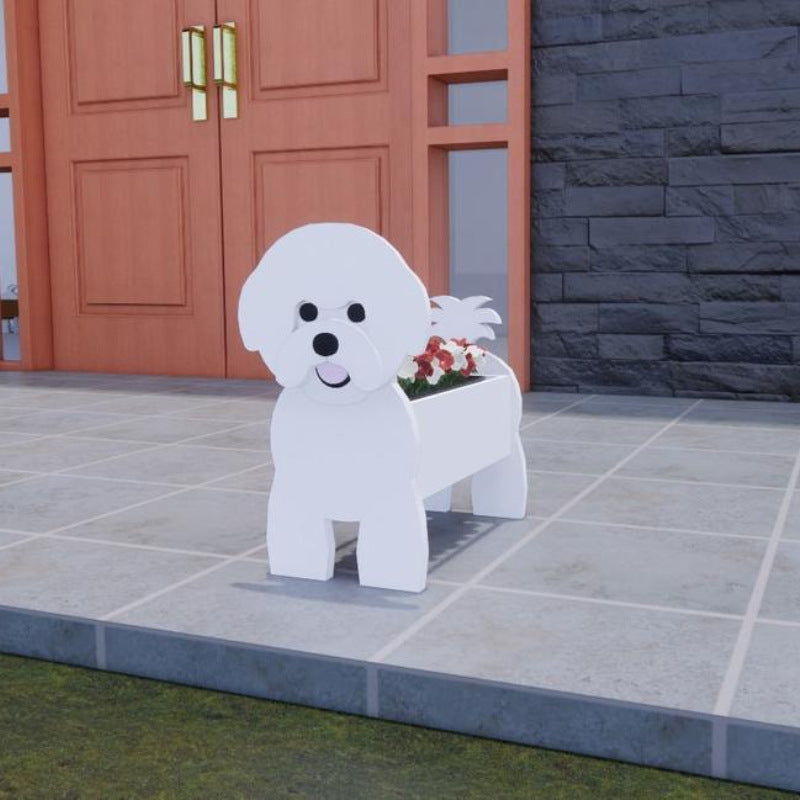 White dog-shaped planter with flowers on a patio
