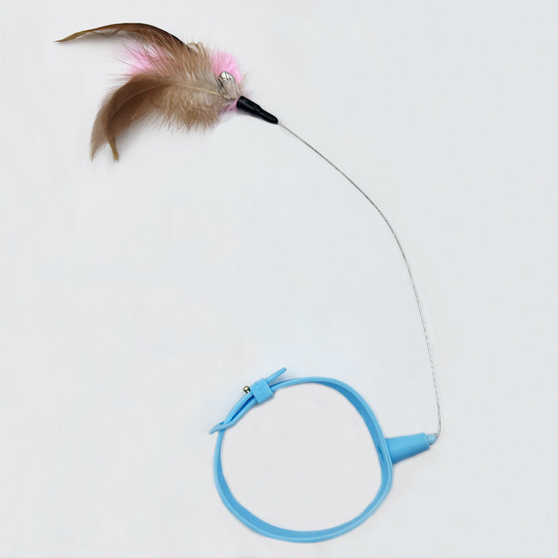 Blue cat toy with feathers on a white background