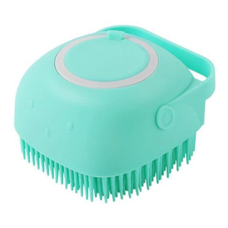 Turquoise silicone scrubber with bristles on a white background