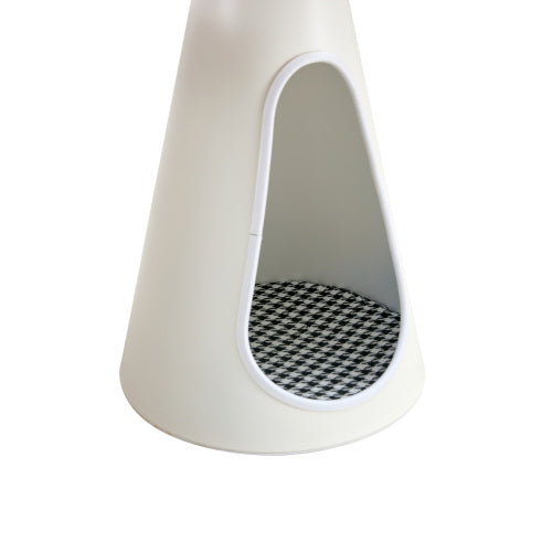 White pet bed with a checkered patterned interior on a white background