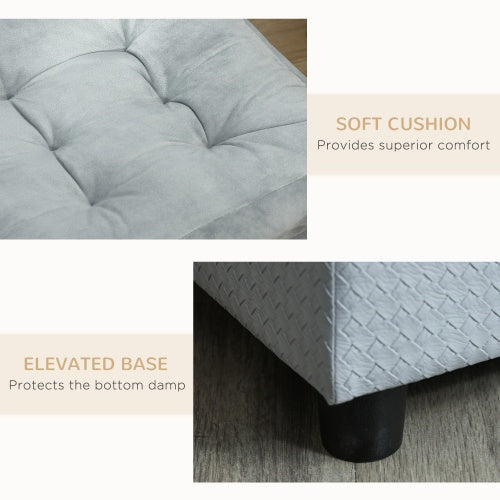 Gray cushion with elevated base on a neutral background, highlighting comfort and protection features.