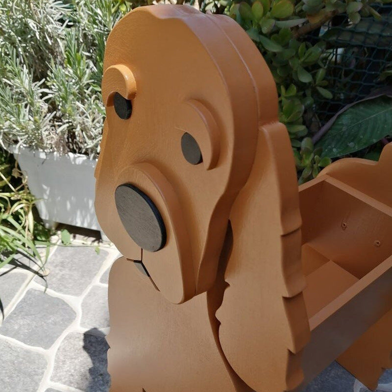 Brown wooden dragon sculpture outdoors on a stone path with plants in the background