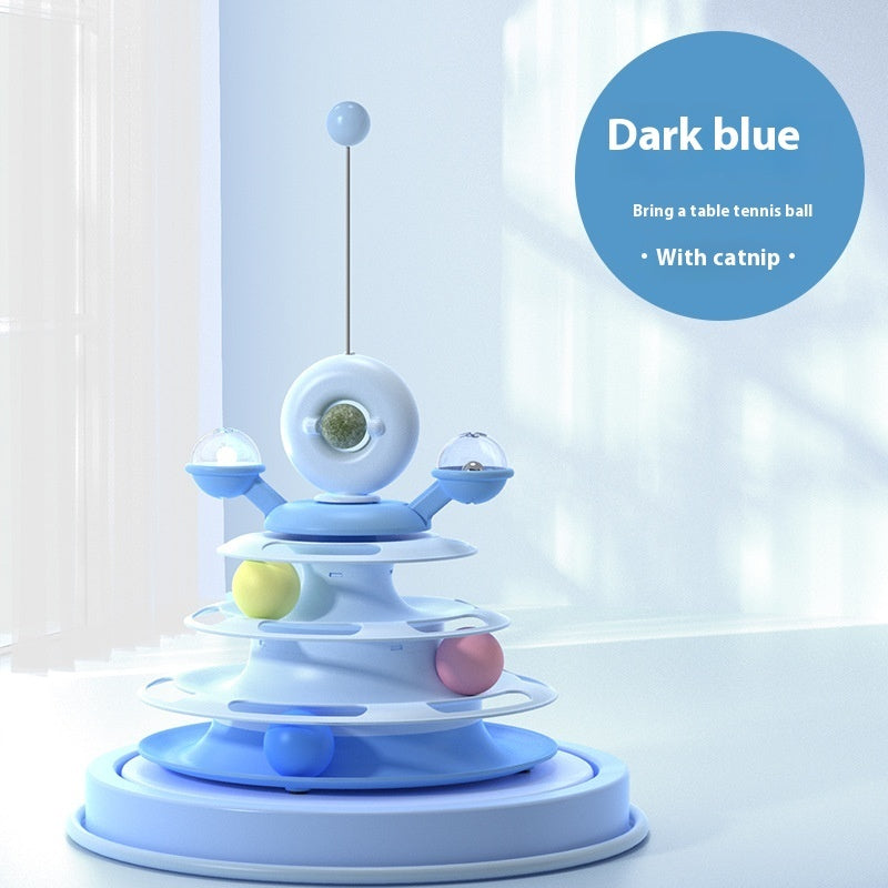 Cat toy with dark blue top and colorful spheres on a light background