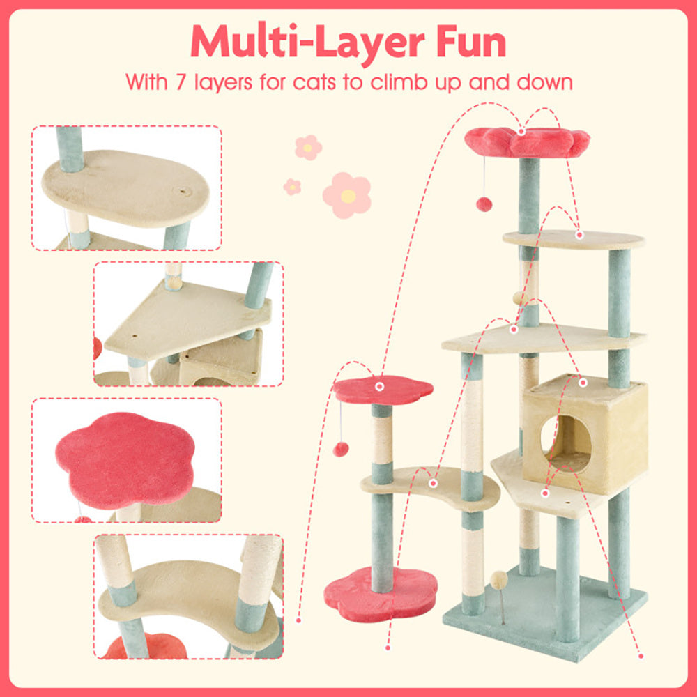 Cat tree with multiple levels and climbing features on a pink background