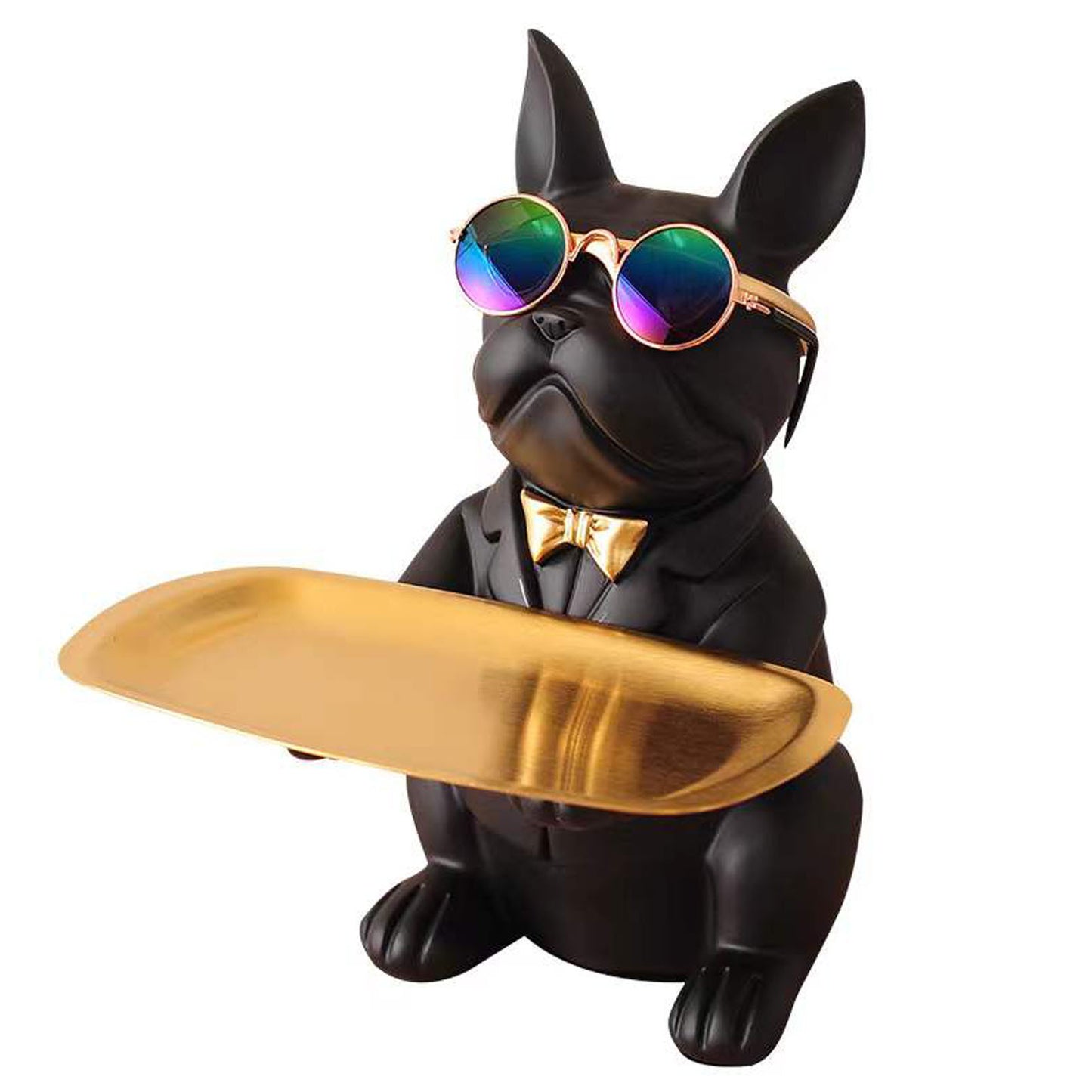 Black dog figurine wearing sunglasses and a bow tie, holding a gold tray on a white background