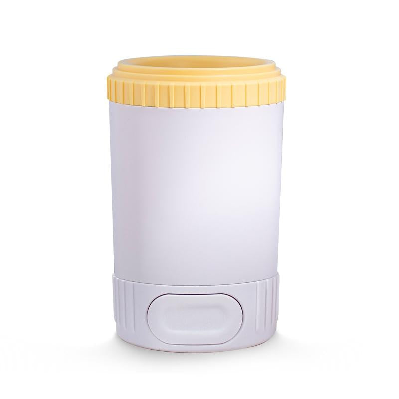 White cylindrical dog paw cleaning container with a yellow lid on a white background