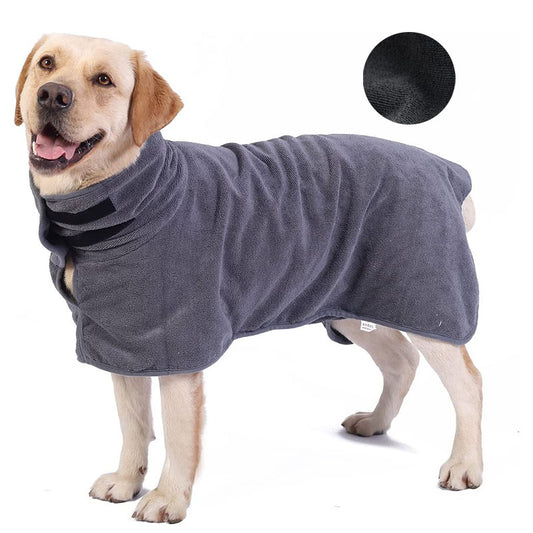 Dog wearing a gray fleece coat on a white background