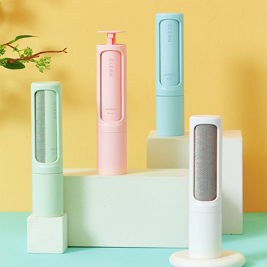 Four cylindrical cleaning devices in pastel colors on a yellow and blue gradient background.