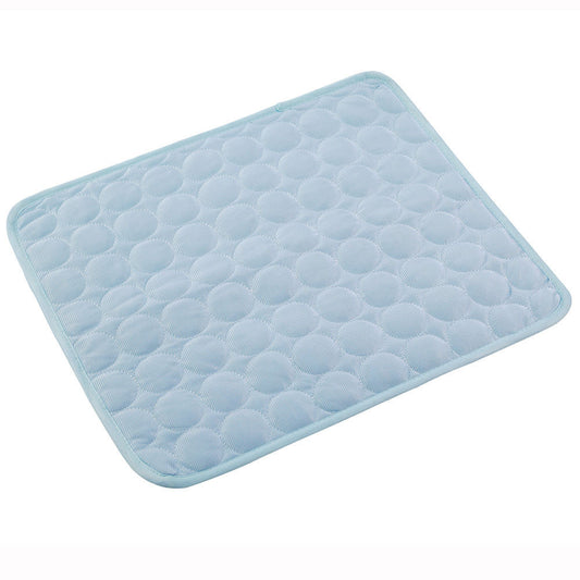 Light blue quilted self-cooling pet mat on a white background