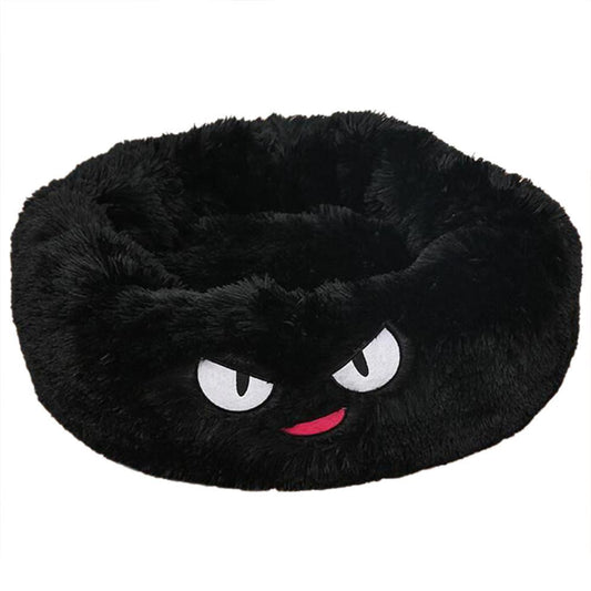 Black plush headband with cartoonish face on a white background