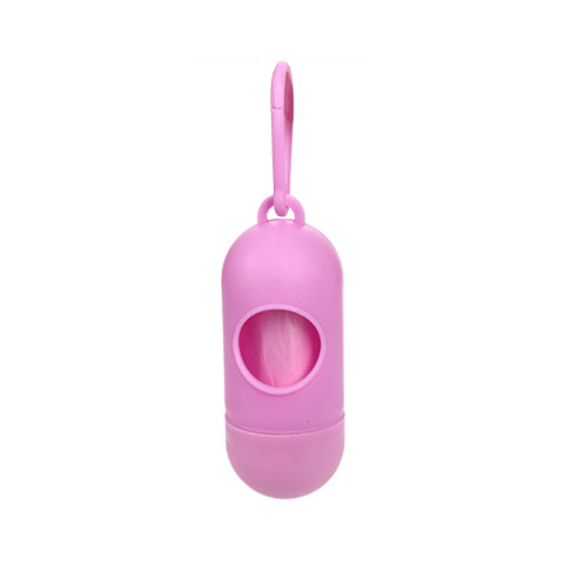Pink silicone poop bags with a keychain hook on a white background
