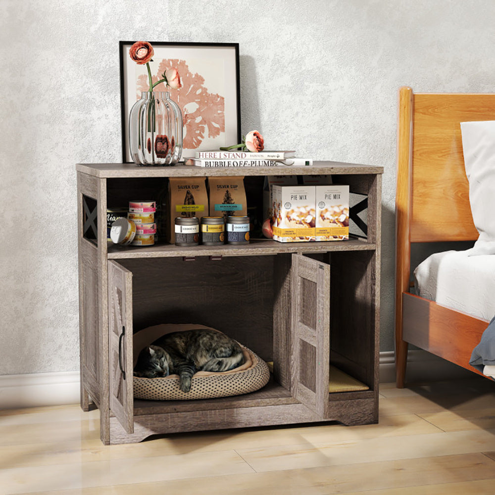 Wooden pet crate with a cat inside in a bedroom setting