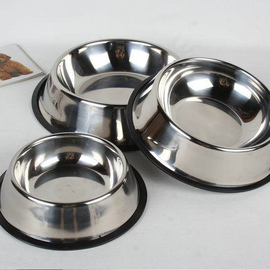 Three stainless steel bowls on a white surface