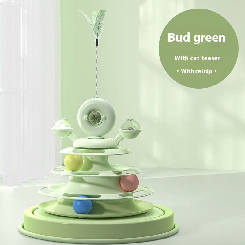 Green cat toy with colorful balls and a feather on a white background