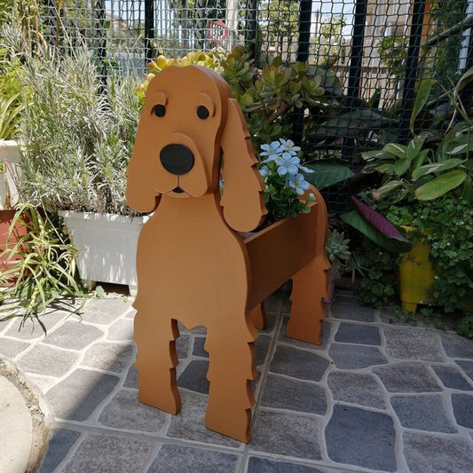 Wooden dog-shaped planter in a garden setting