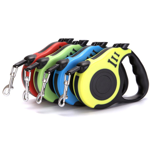 Set of four colorful retractable dog leashes on a white background