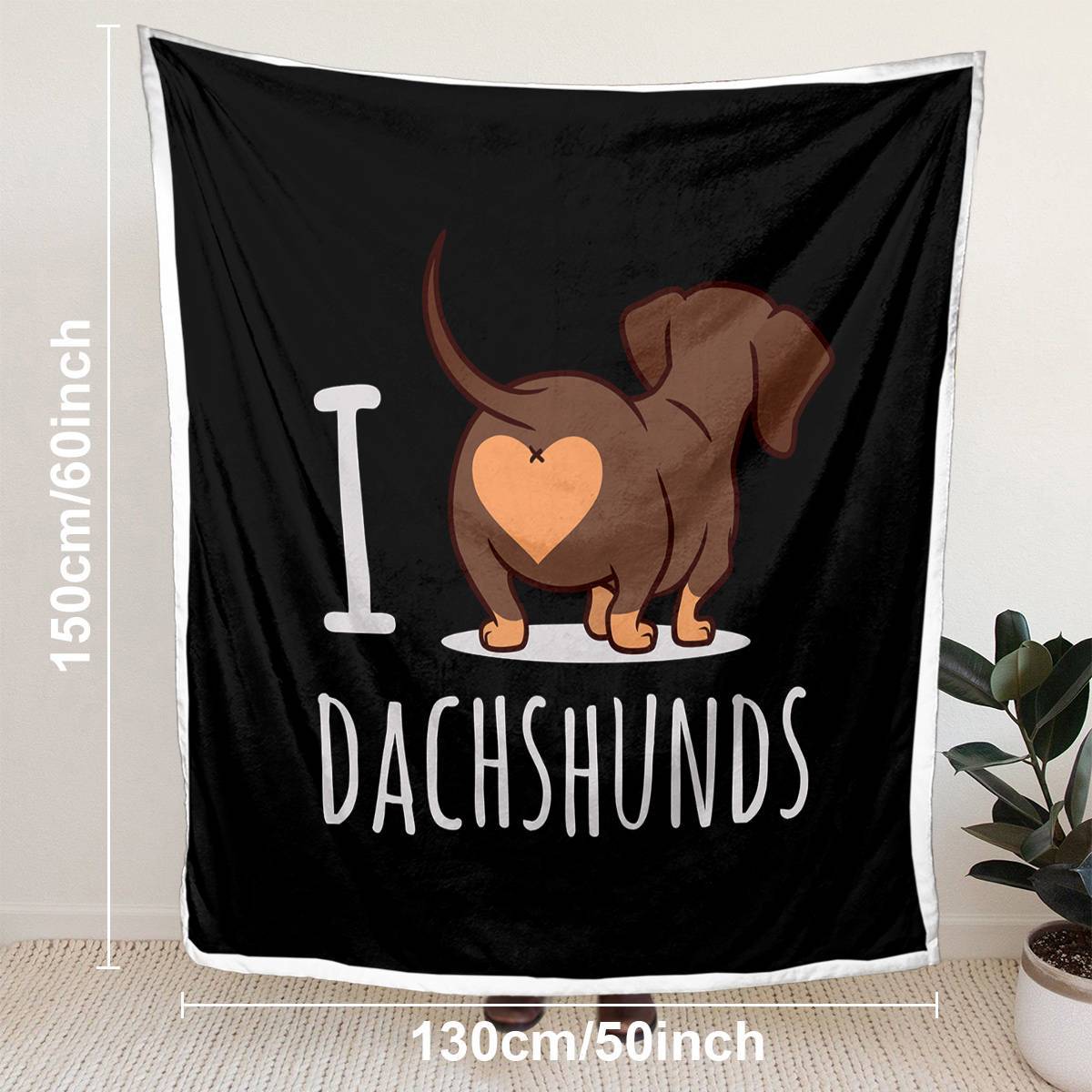 Black blanket with a dachshund design and 'I love dachshunds' text, displayed with dimensions.