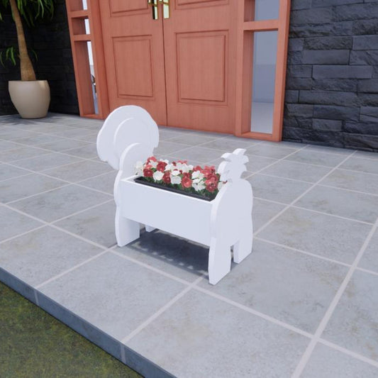 White dog-shaped planter with flowers on a tiled patio