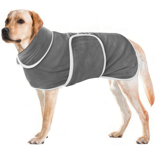 Dog wearing a gray bathrobe with white trim on a white background